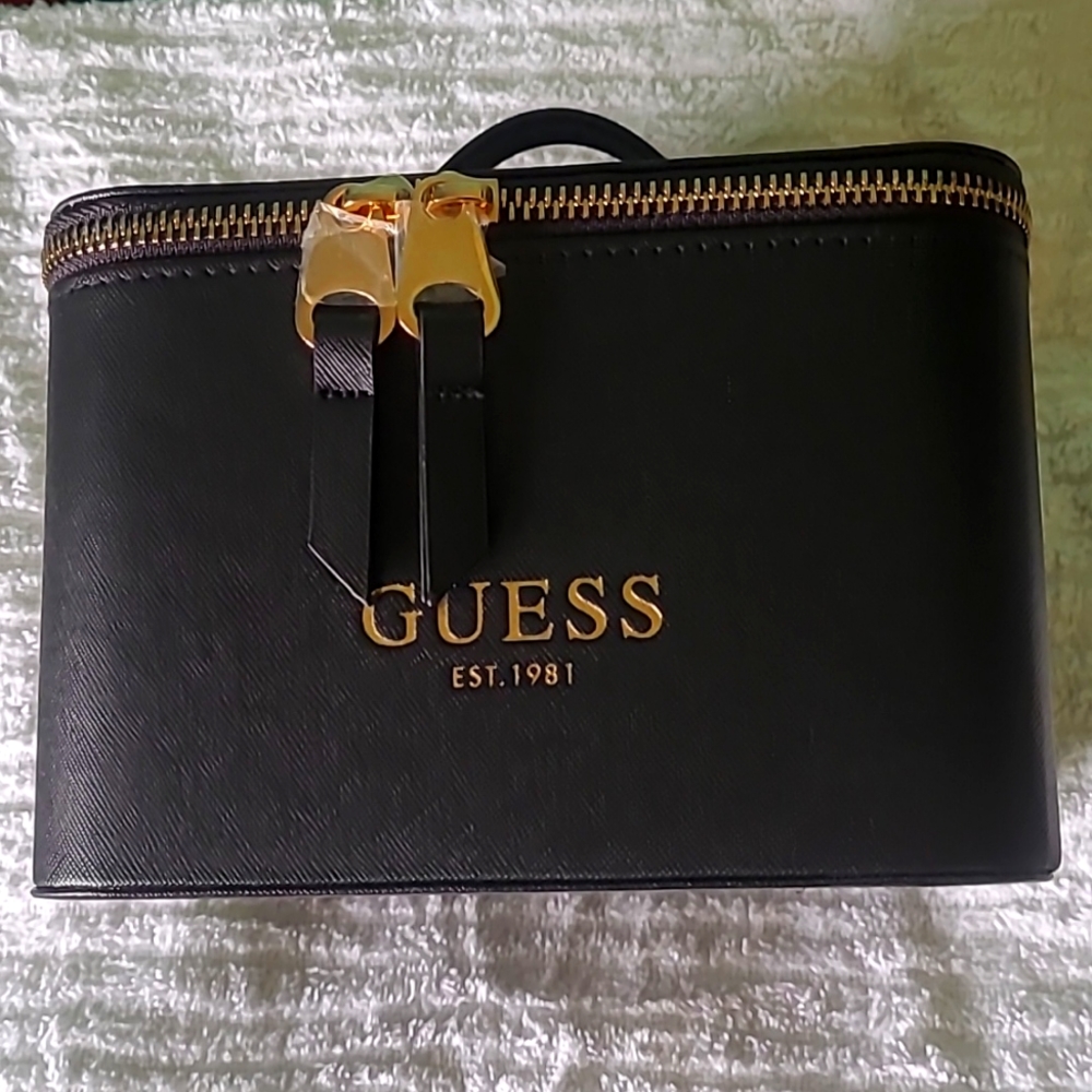 Guess stackable small carrying case.